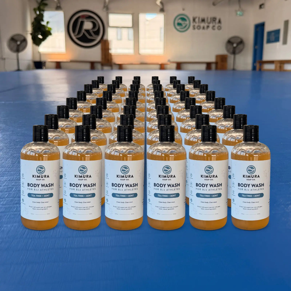 Multiple bottles of Kimura Body Wash 48x 16 oz - Tea Tree + Mint